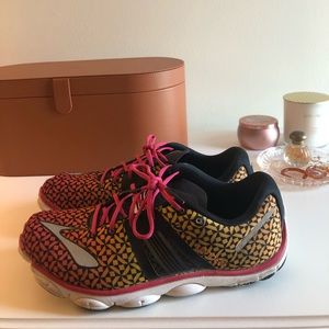 Brooks pink and yellow running shoes